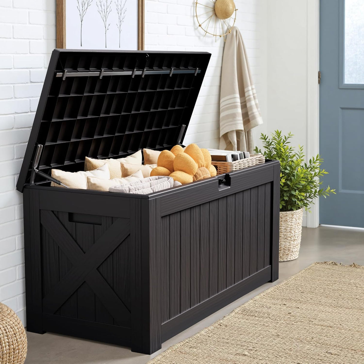 Patioslife 90 gallon black outdoor storage box with pillows, indoor patio setting