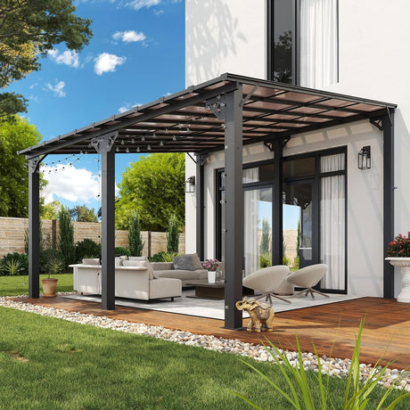 Patioslife 10×12ft patio pergola with dark frame, outdoor sofa seating, string lights, and garden setting beside a modern house