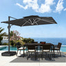 Patioslife 10x13 ft black cantilever umbrella with LED lights over poolside dining table and ocean view patio