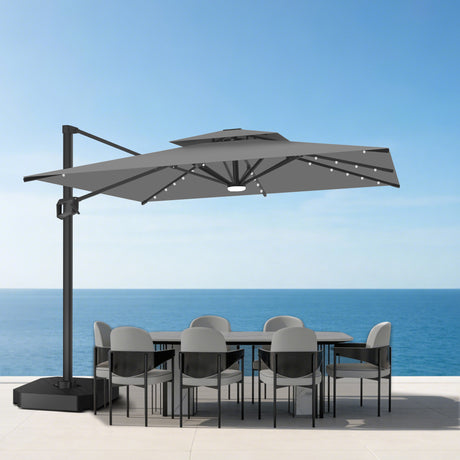 Patioslife 10x13 ft charcoal cantilever umbrella with LED lights over ocean view outdoor dining set