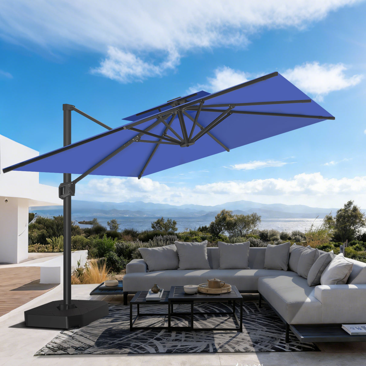 Patioslife 10x13 ft navy blue cantilever umbrella over outdoor sectional sofa and coffee table on ocean view patio