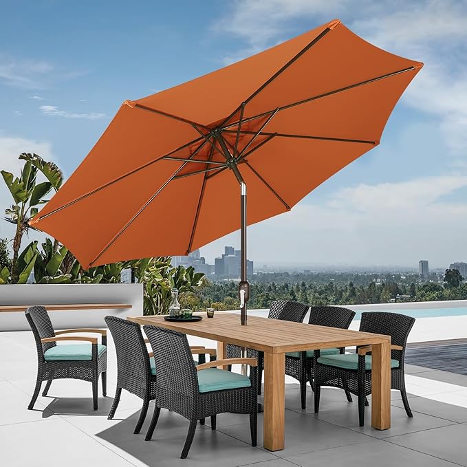 Patioslife orange patio umbrella with crank lift over outdoor dining table and chairs for poolside shade